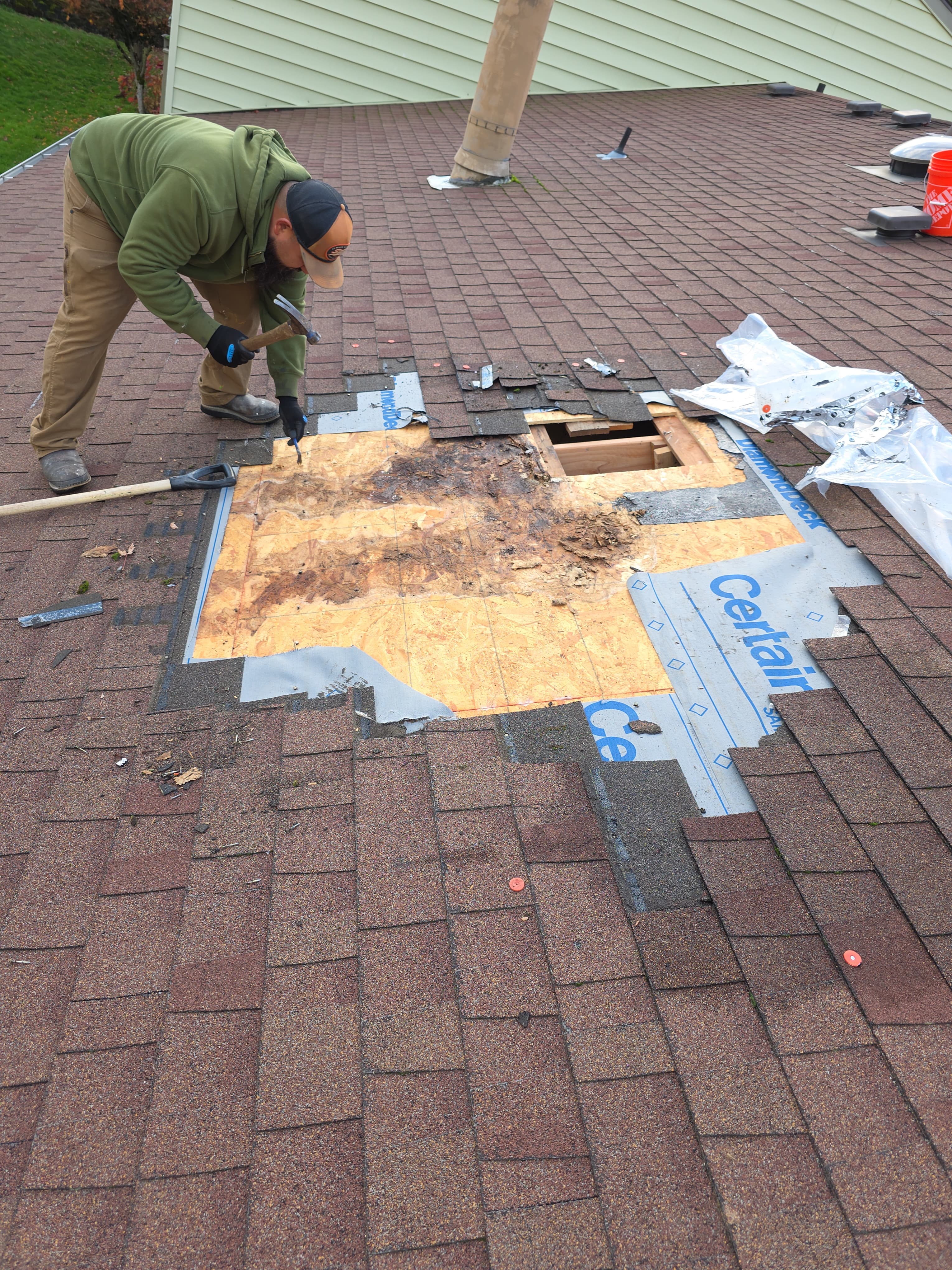 Before: Severe storm damage to roof