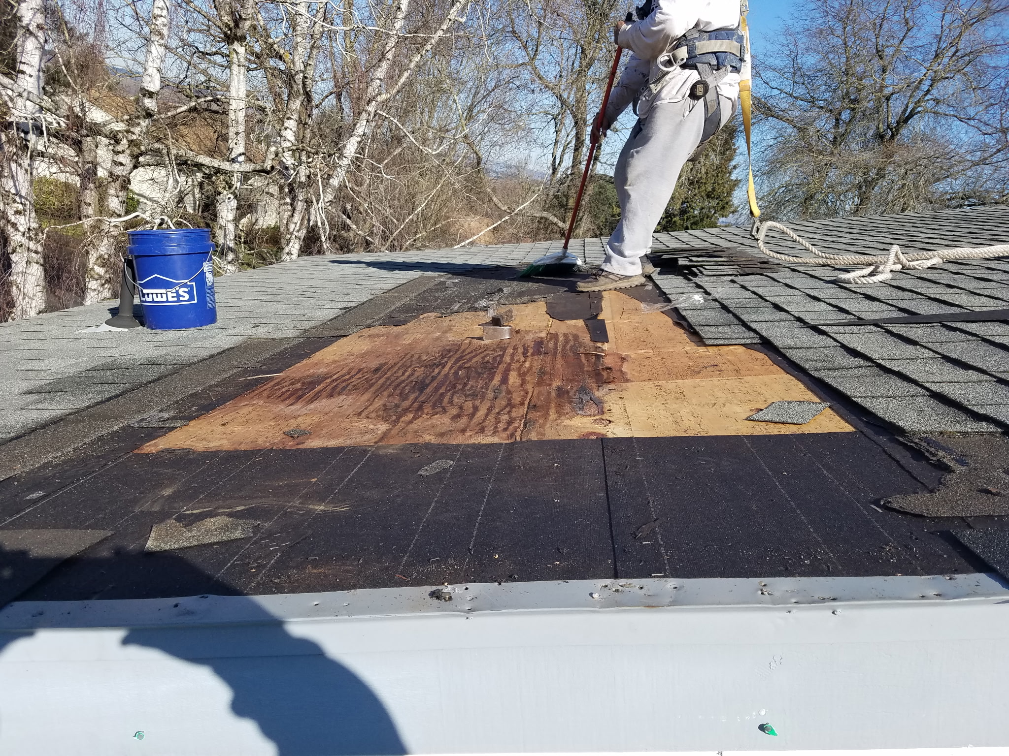 Roof tear-off and shingle installation